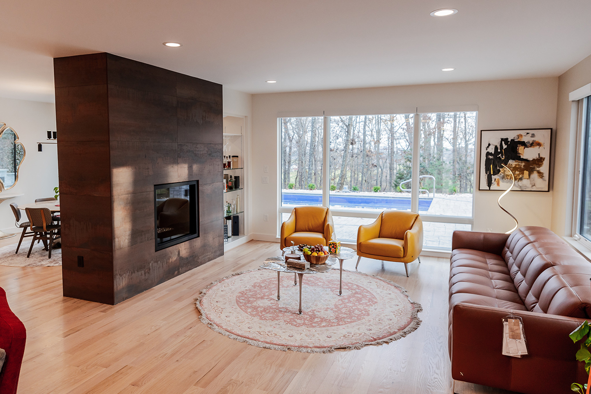 Multigenerational Modern home living room by Progress Street Builders